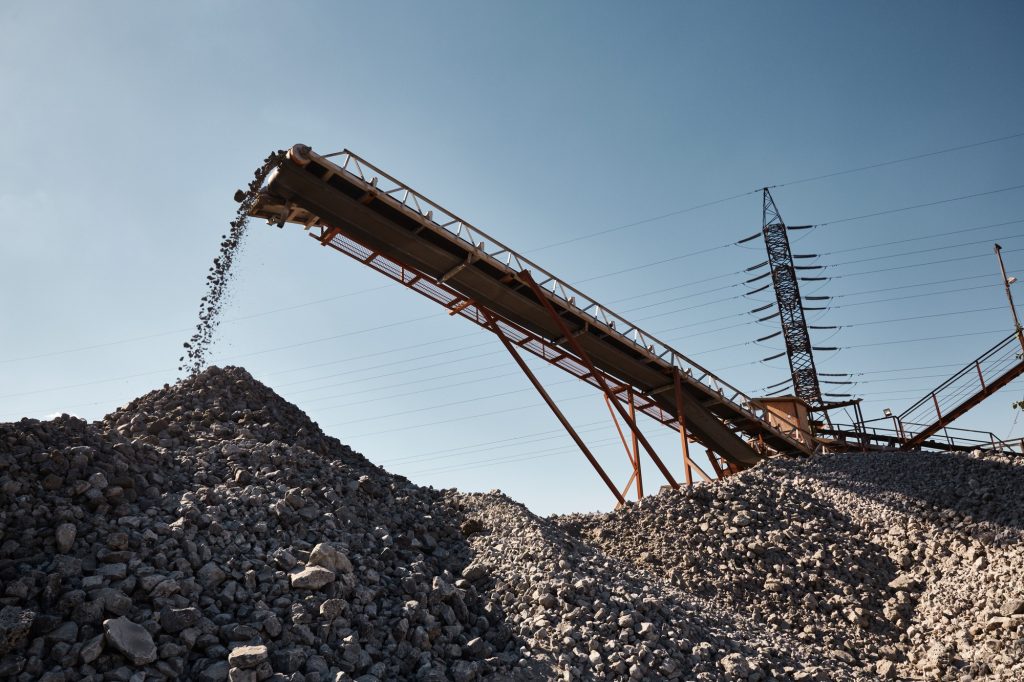 Conveyor belt on slag heap