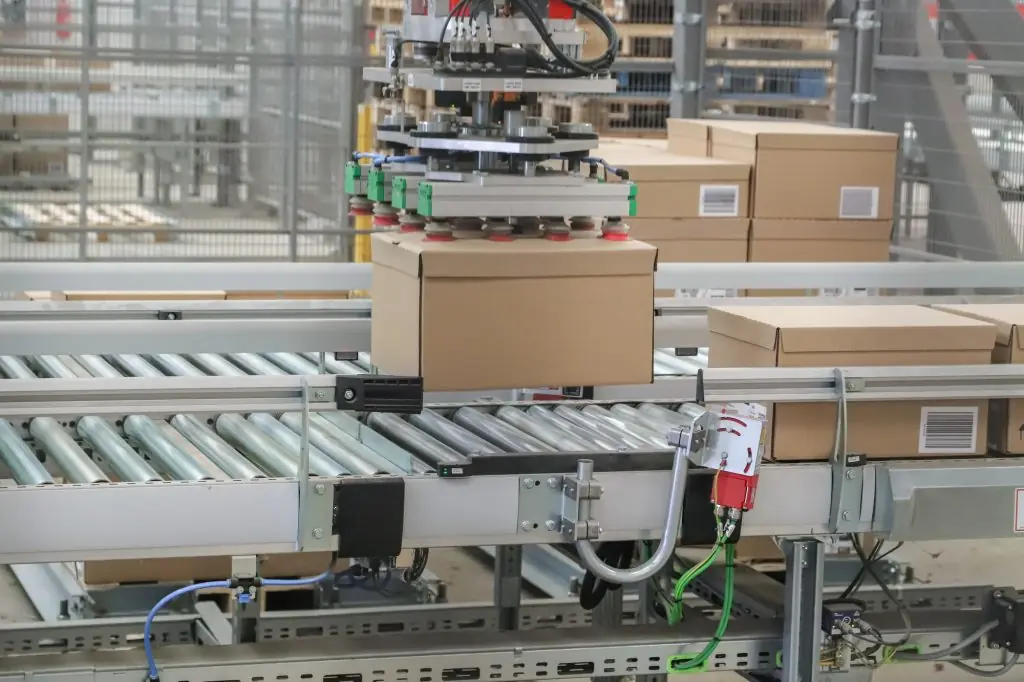 packing line in a logistics warehouse. conveyor belt in a modern production line